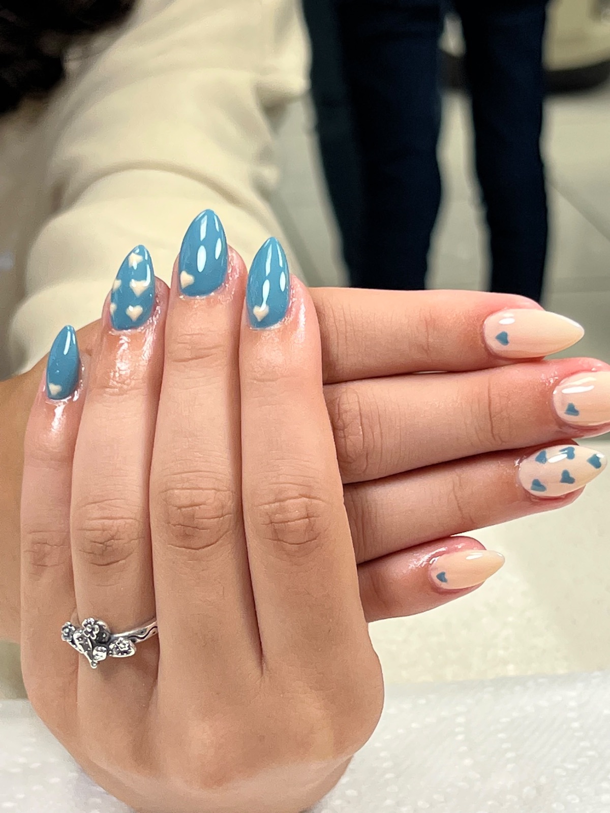 Blue and nude heart nail art