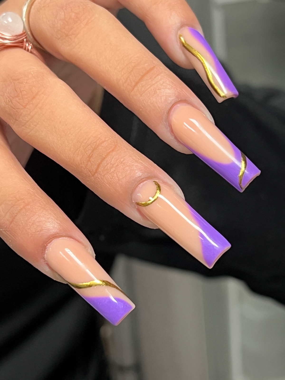 Purple ombre nails with gold accents
