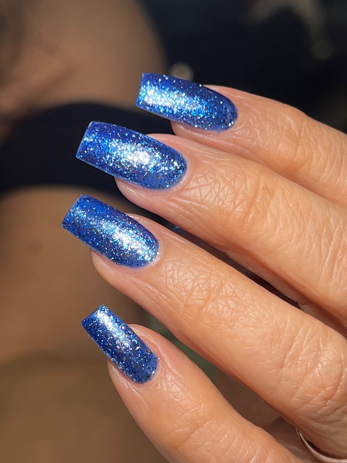 Sparkling blue glitter nails