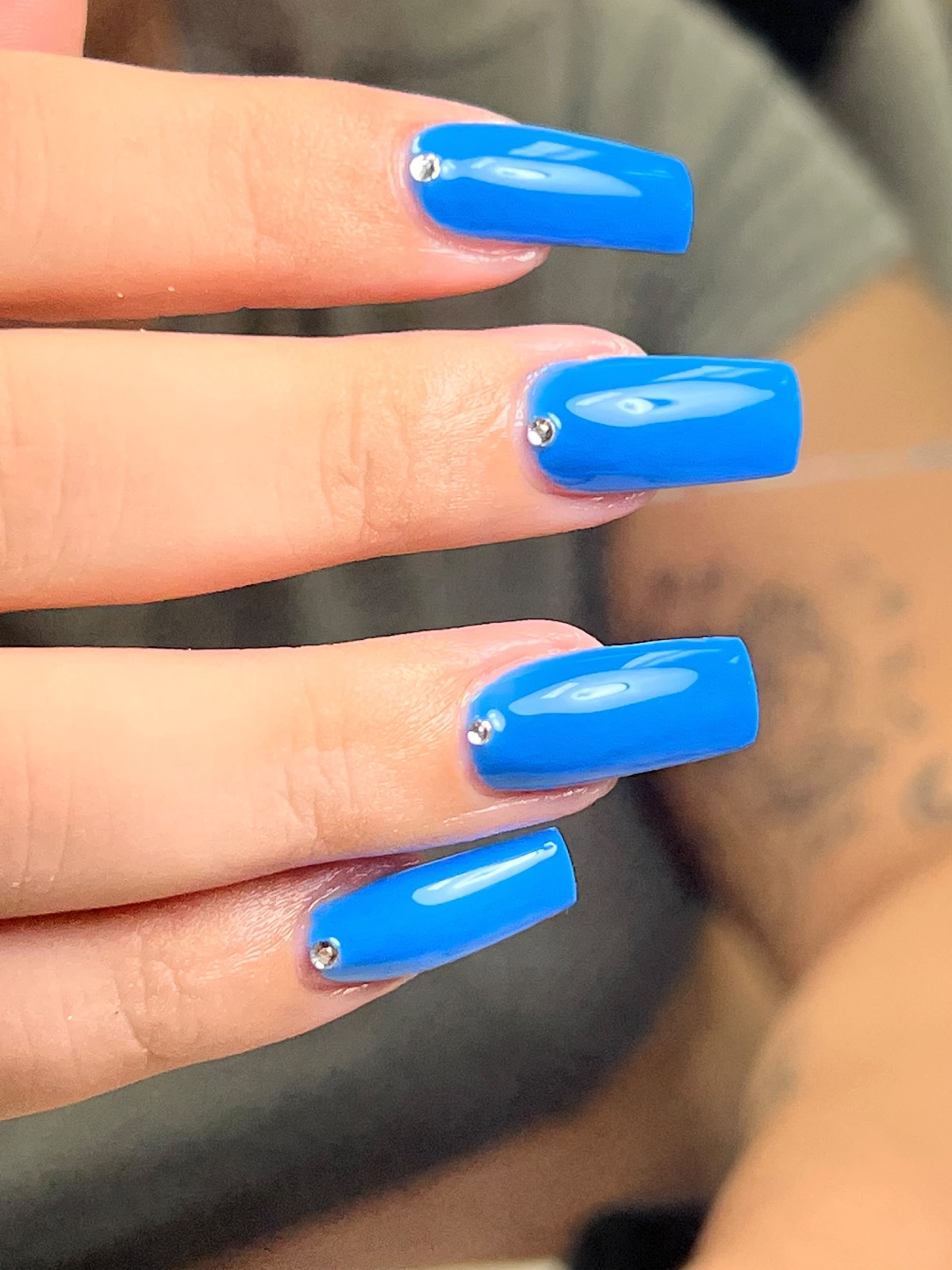 Blue square nails with crystal accents